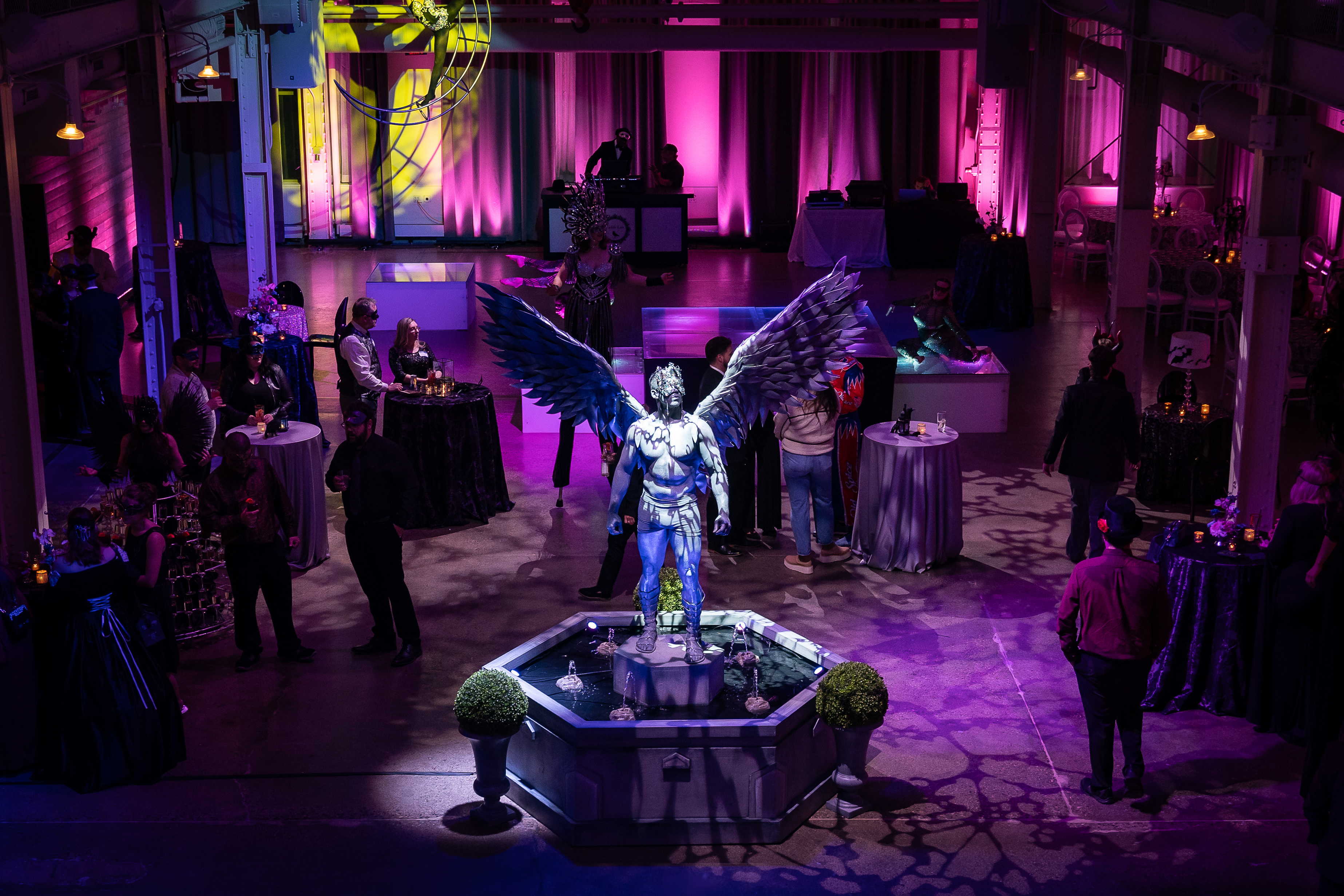 Living statue angel performer at corporate gala