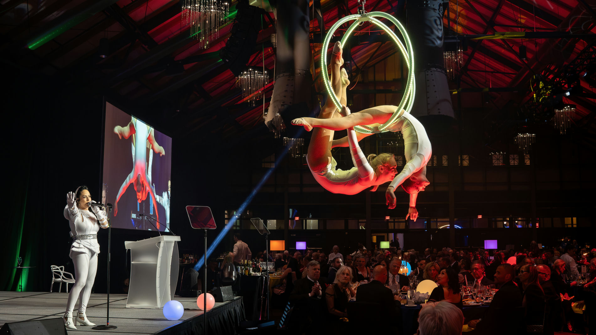 Nonprofit gala entertainment with dramatic lighting